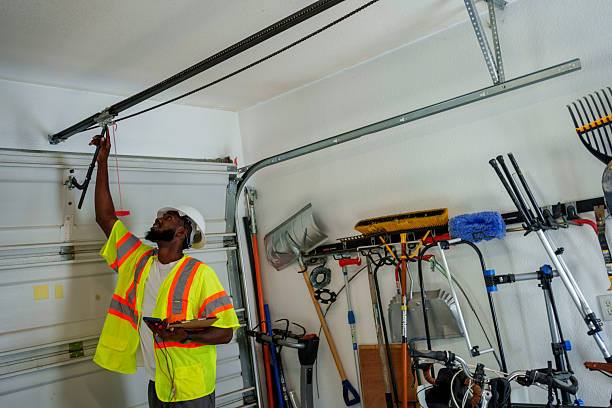 Professional Garage Door Panel Replacement technician working in McIntosh County County, OK